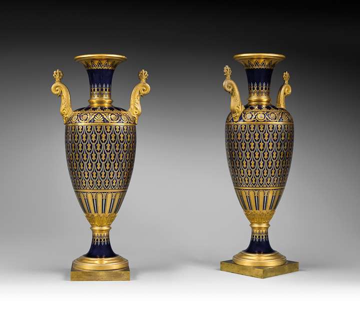 A royal pair of Sèvres ormolu-mounted two-handles porcelain beau bleu Vases Fuseaux. Sèvres, Imperial Manufacture of Sèvres ,1813.